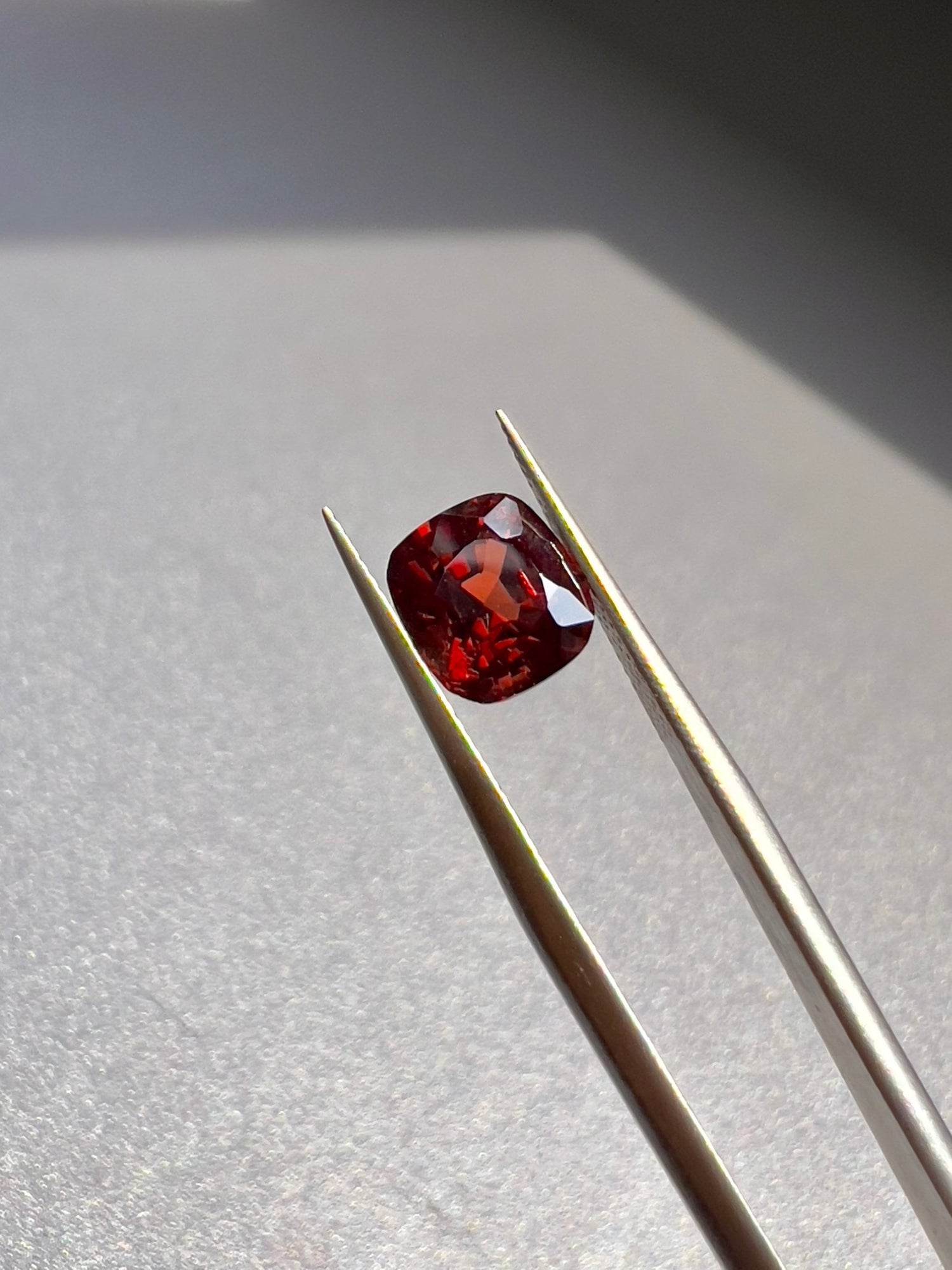 A deep, rich Burmese red spinel with a brilliant glow